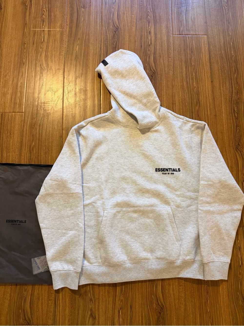 Essentials Light Gray Pullover Hoodie with Chest Logo